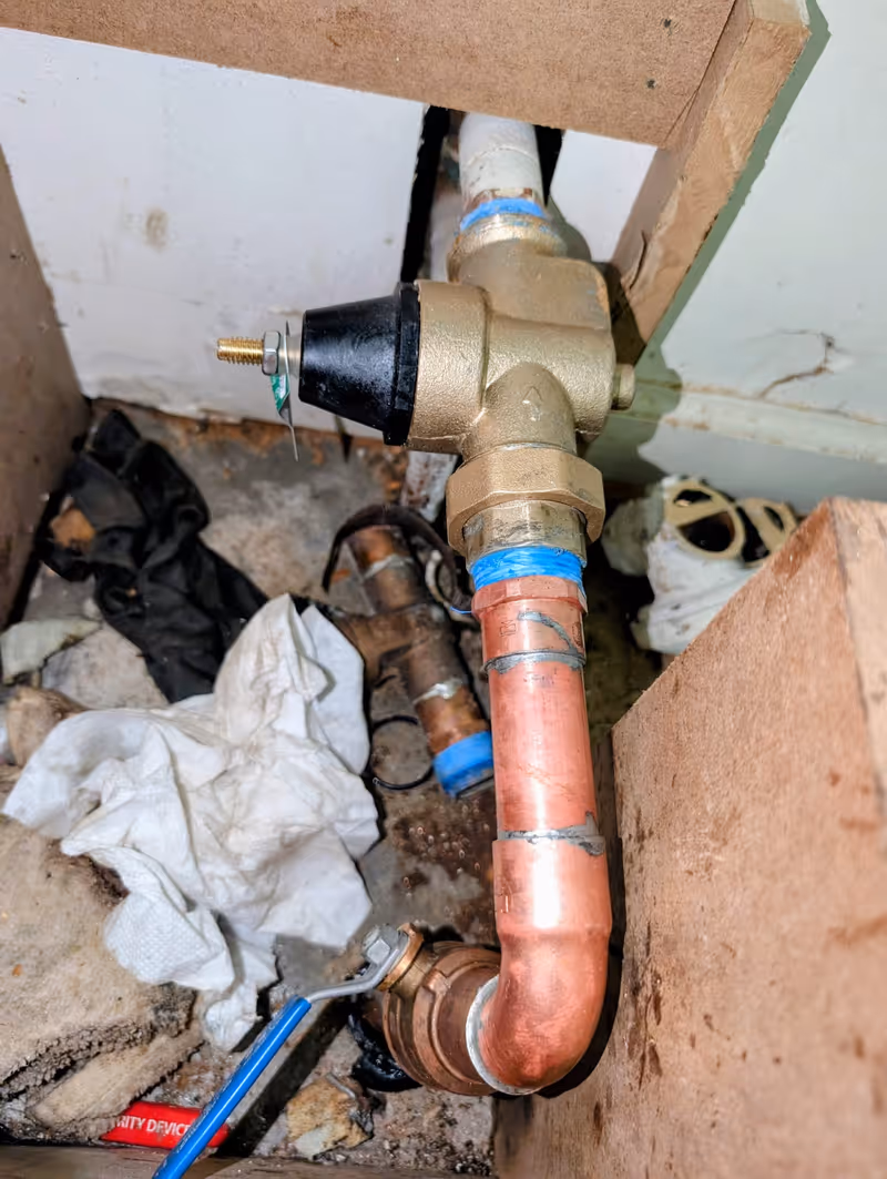 Water pressure regulator and shut-off valve replacement on Kanis corridor