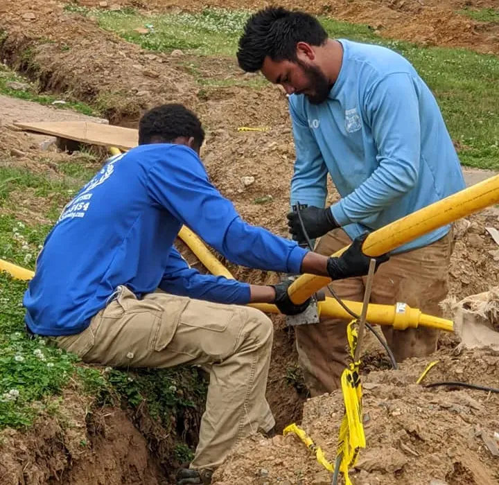 Diamond State Plumbing crew installing underground gas lines