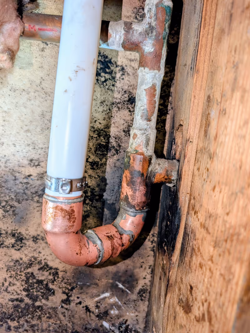 New PEX line rerouted above slab to bypass a leaking copper pipe buried in concrete