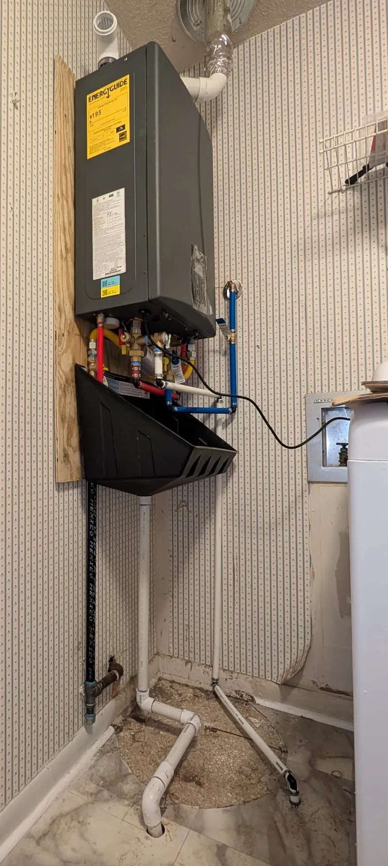 Tankless water heater installation in a Kanis Road home
