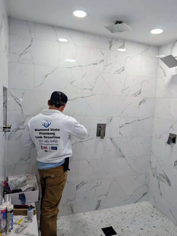 Diamond State Plumbing team working on a project in Little Rock