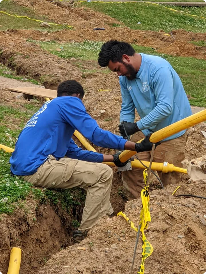 Diamond State Plumbing team working on a gas line in Little Rock