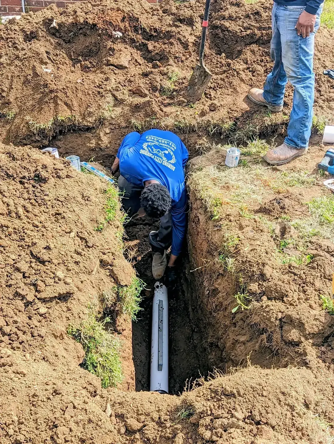 Diamond State Plumbing team working on a sewer line project in Little Rock